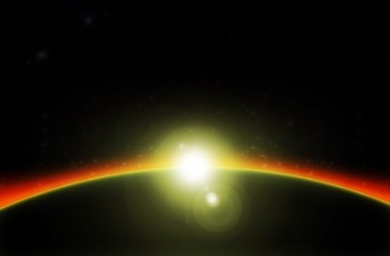Light from a star appearing over the horizon of another planetary body.